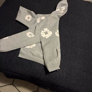 Denim Tears Gray Hoodie with White Floral Design